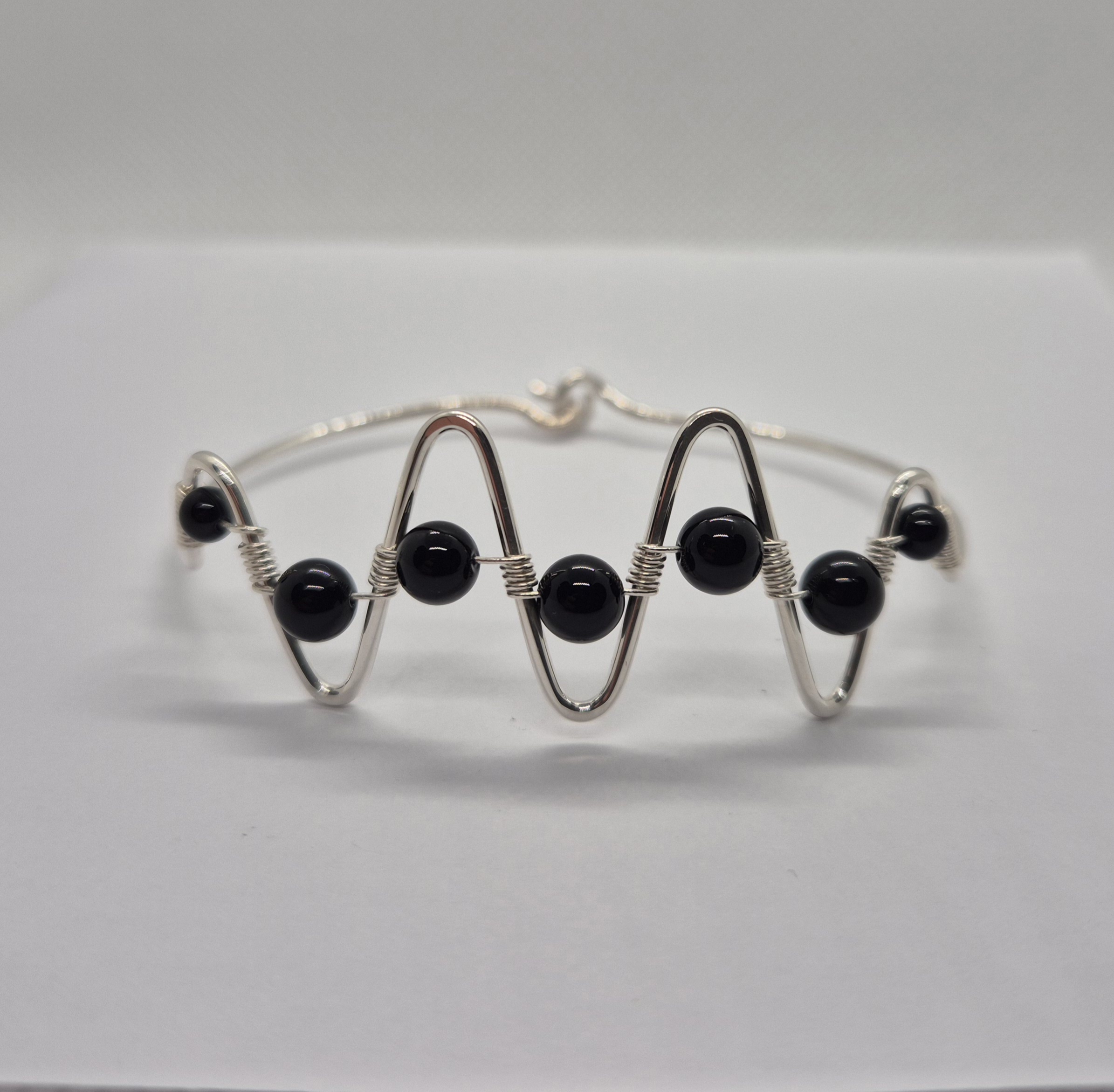 Silverarmband Sicksack med onyx