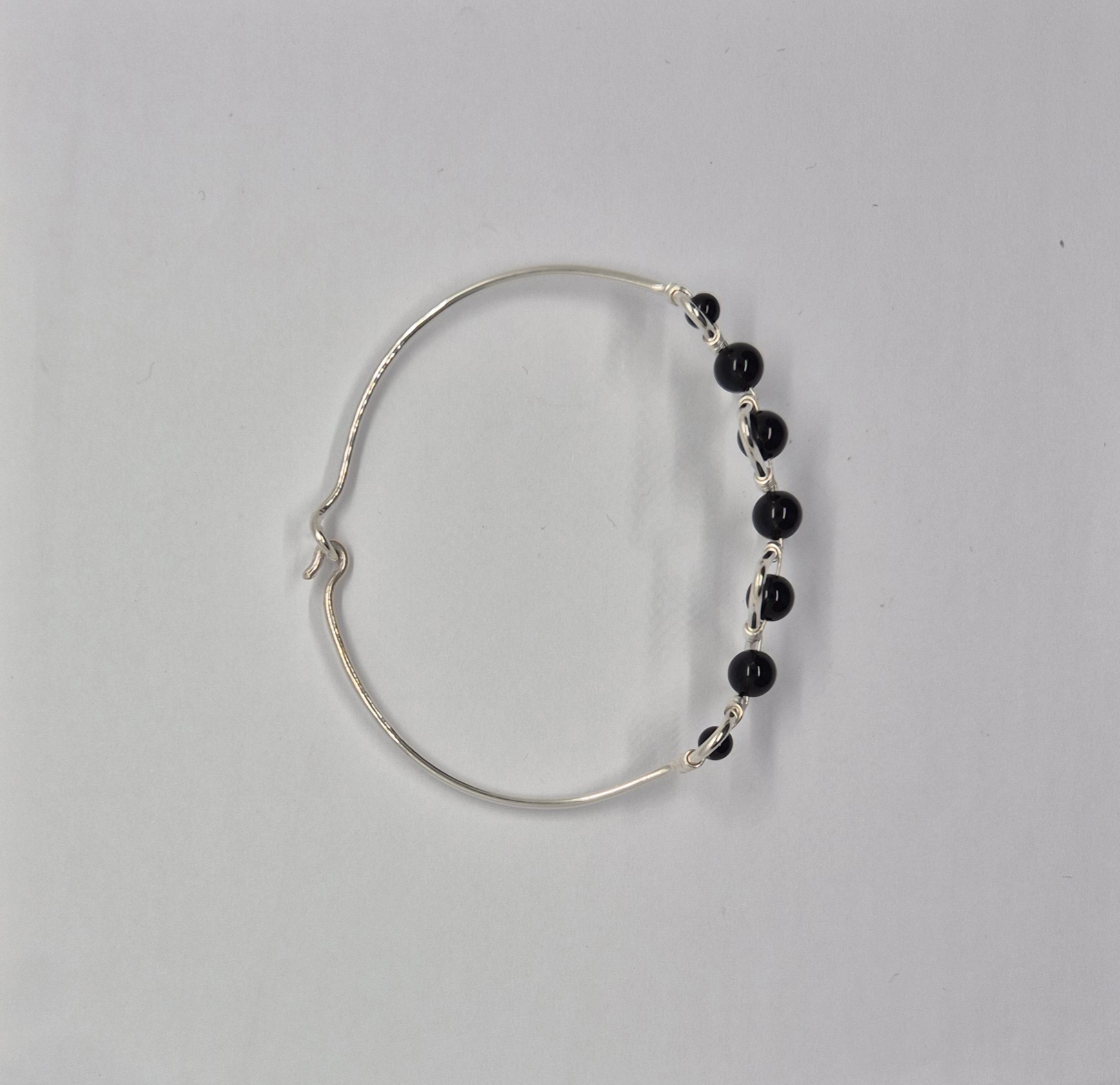 Silverarmband Sicksack med onyx