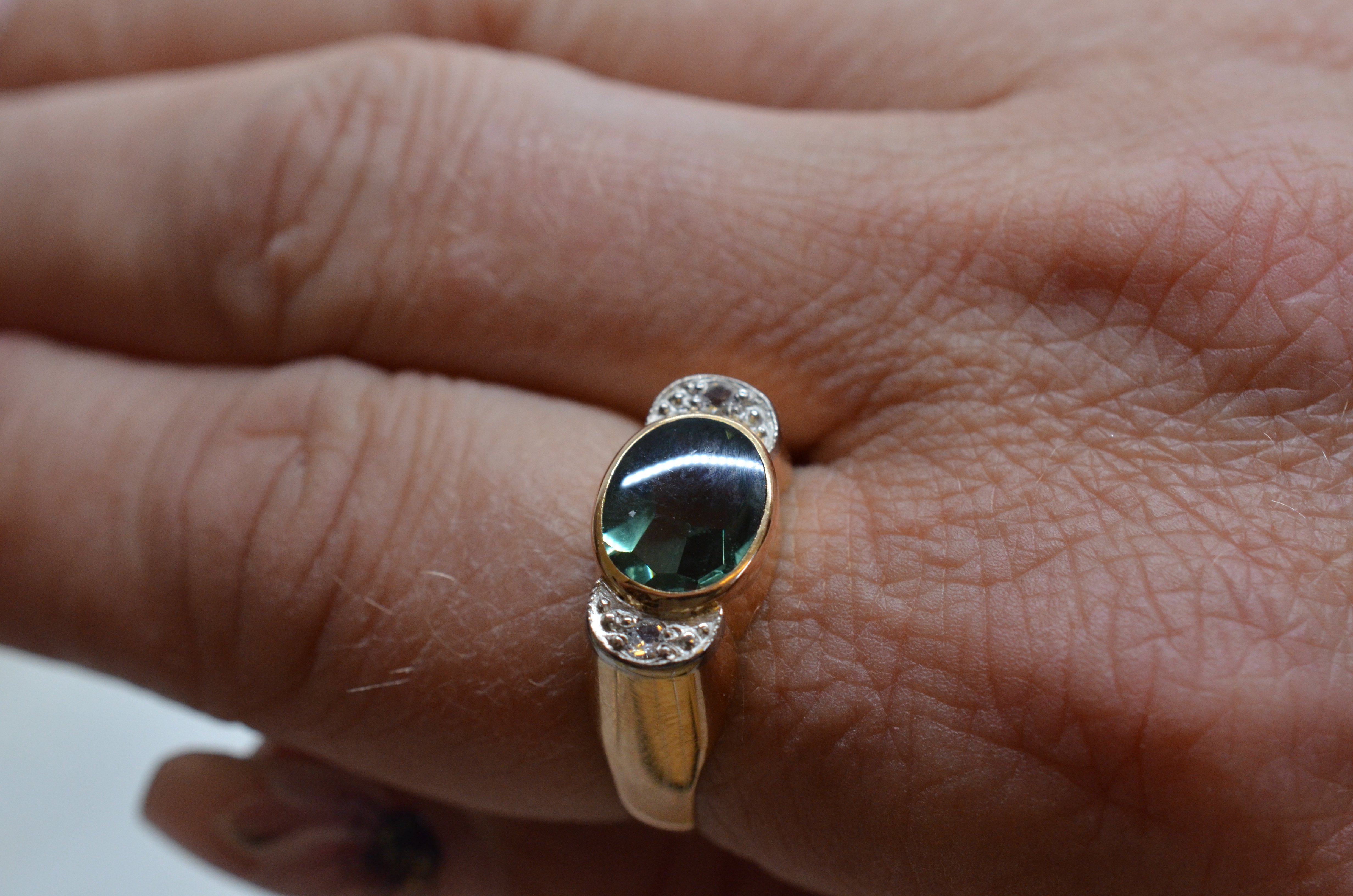 Vintage 18k ring with green stone, 1961