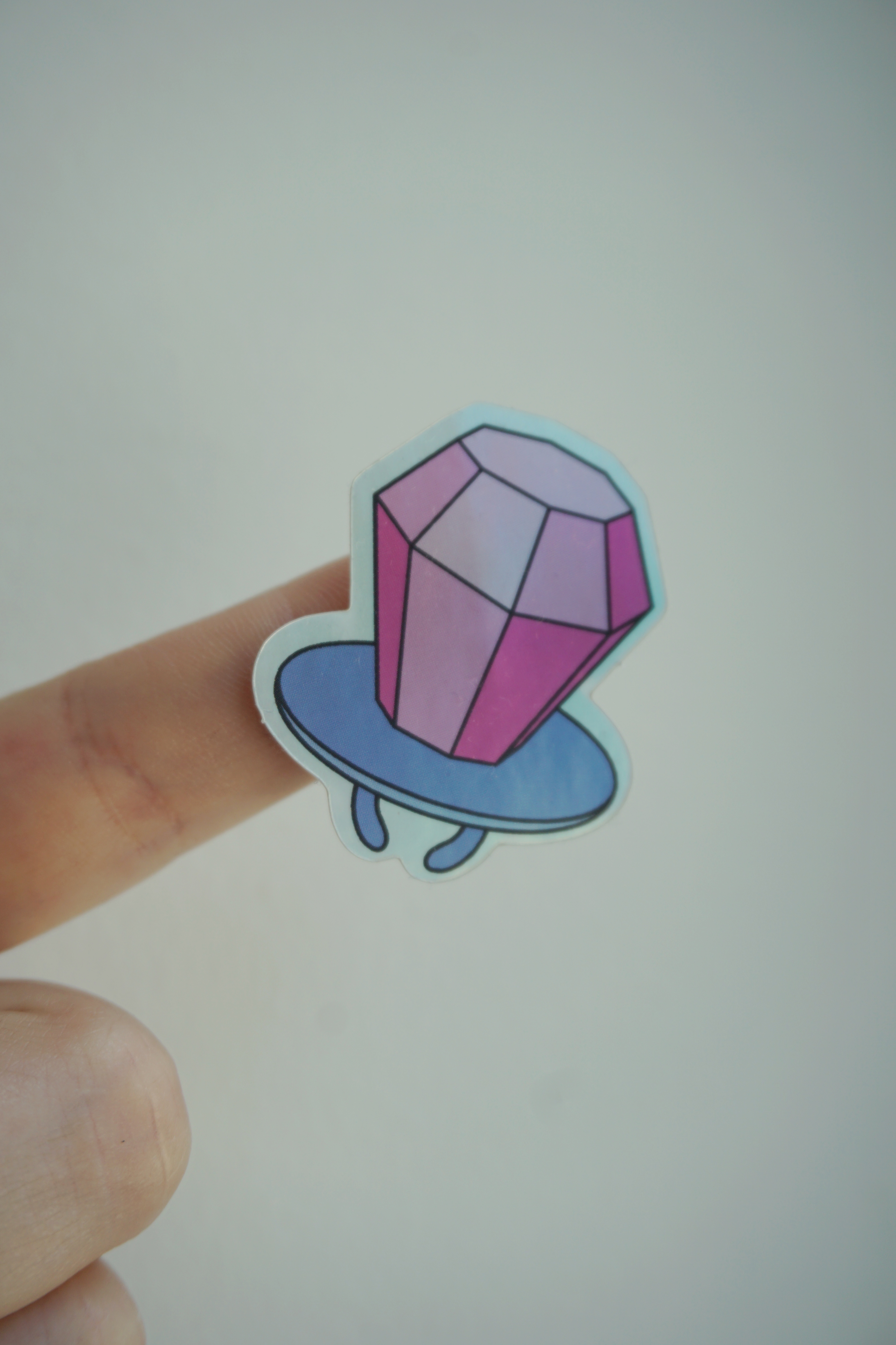 Pop-ring klistermärke