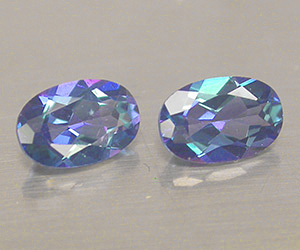 Gemas de topacio azul azoico naturales de corte ovalado a juego, peso total de 1,09 ct - 3