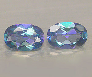 Gemas de topacio azul azoico naturales de corte ovalado a juego, peso total de 1,09 ct