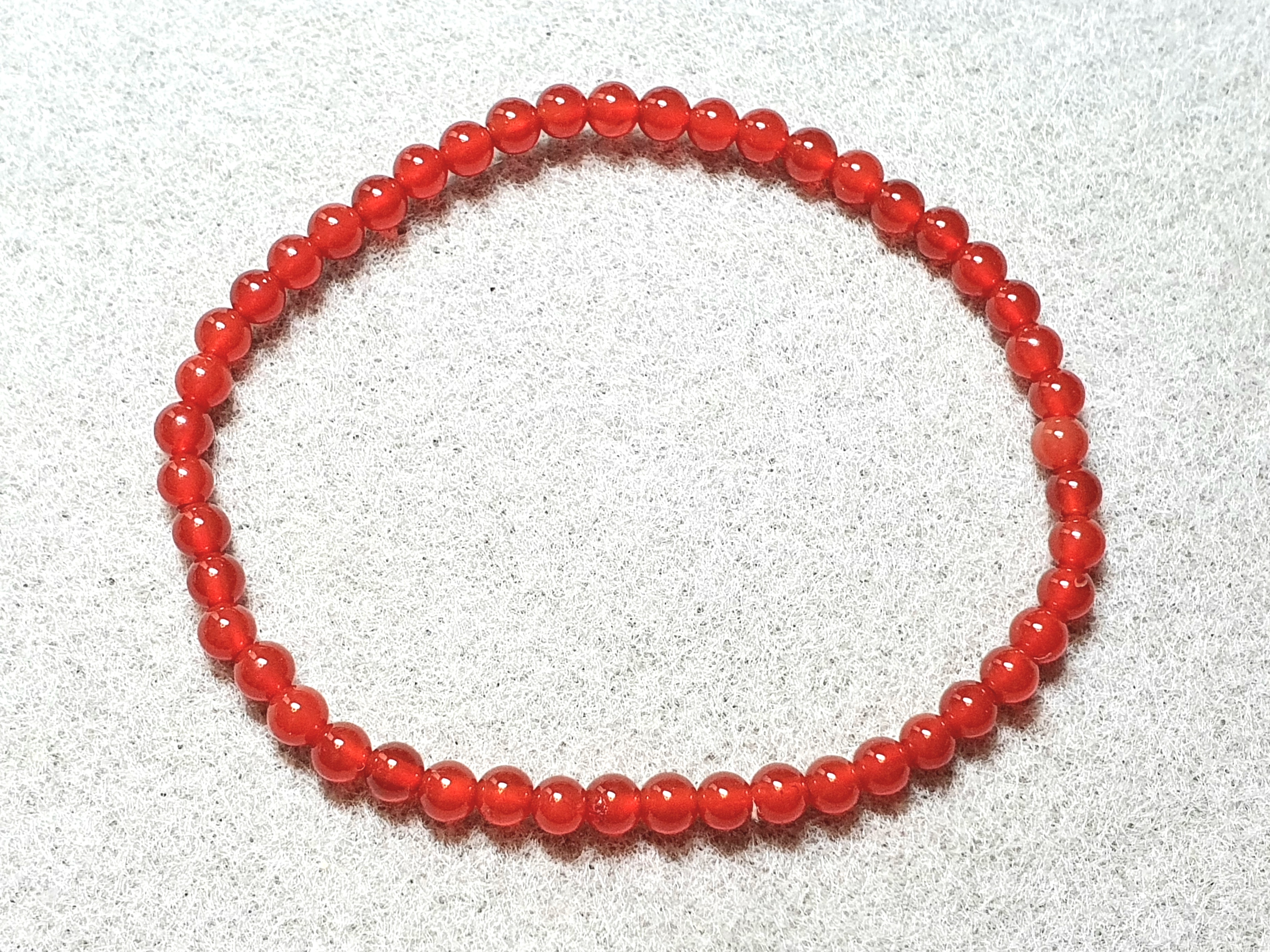 Röd agat ca. 4mm armband ca.19cm 