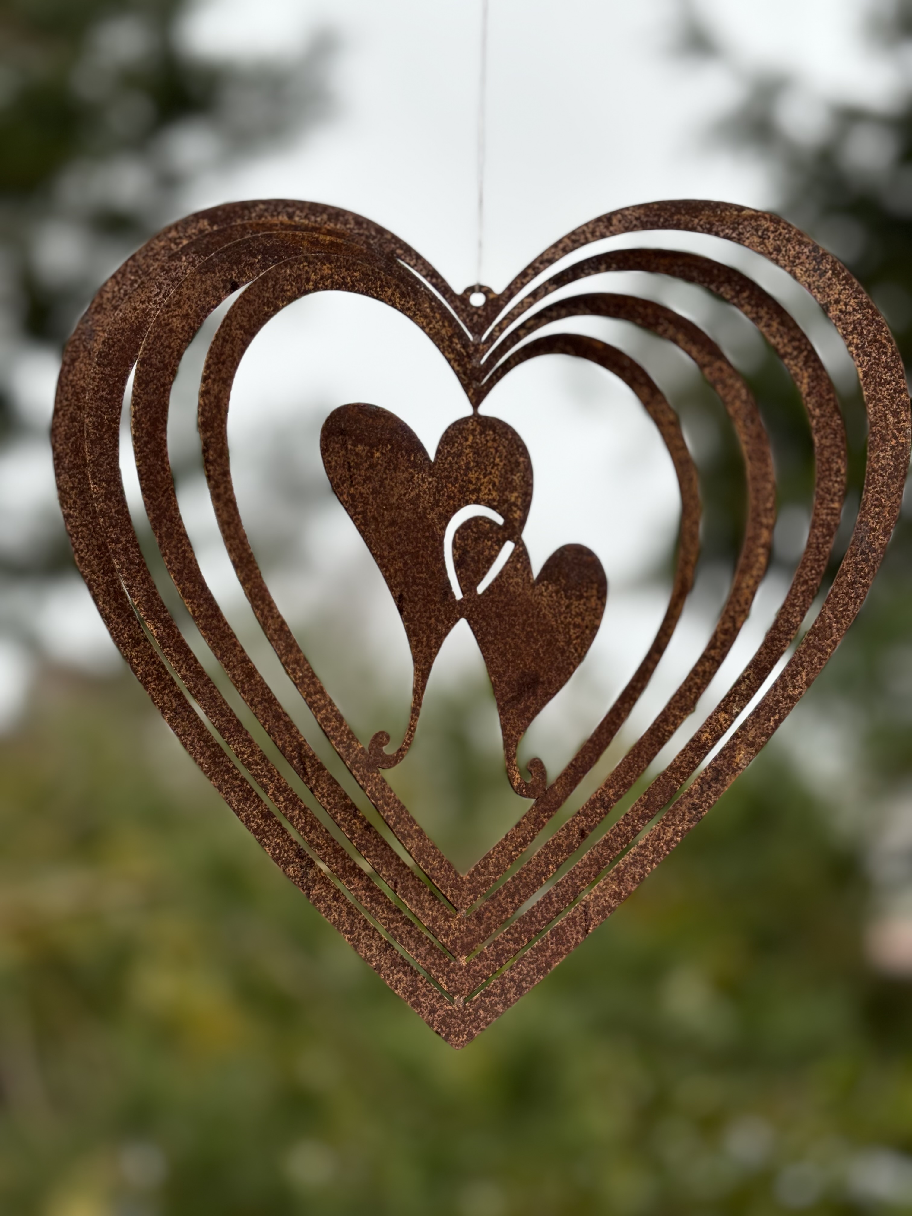 Vindspel två hjärta i rostig plåt 20 cm