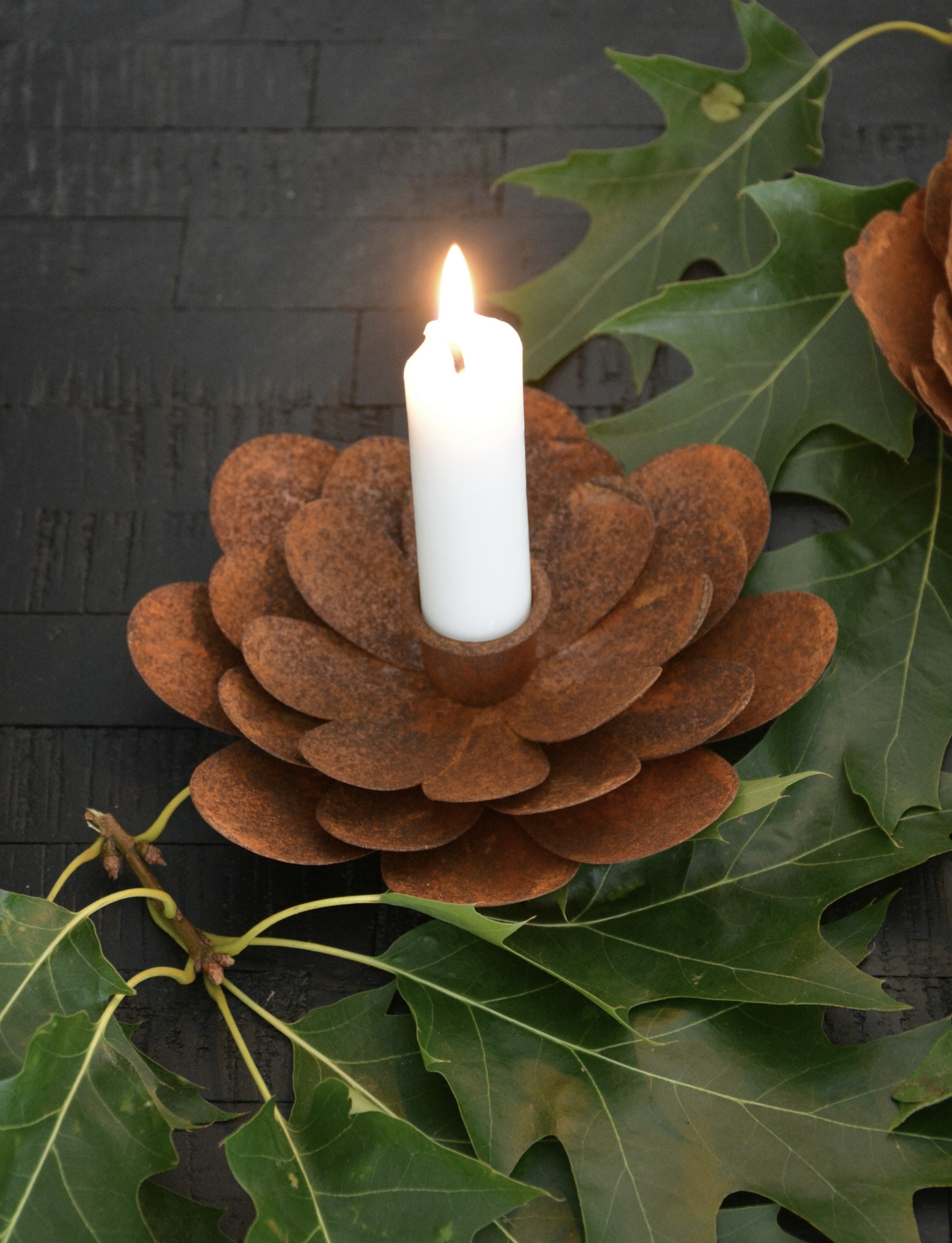 Ljusstake blomma i rostig plåt  14 cm.