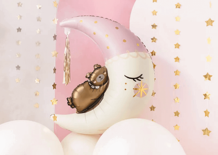 Folieballong teddybjörn på rosa måne som dekoration till babyshower och dop