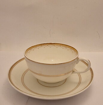 Kaffekopp med fat gulddekor