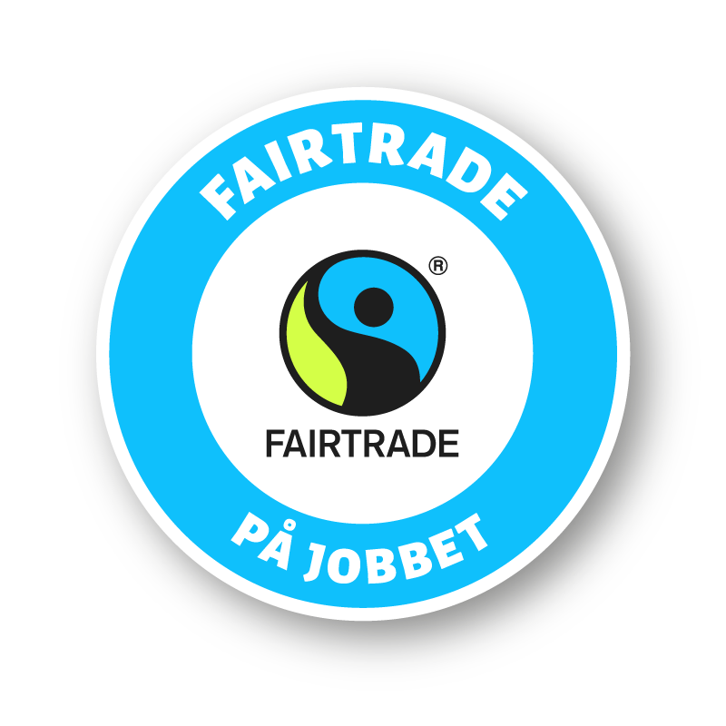Logotyp för Fairtrade på jobbet i en blåvit ring