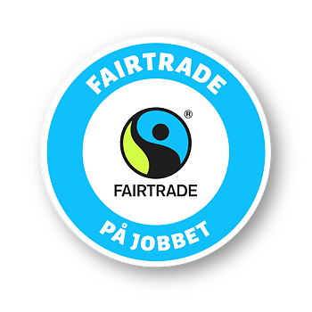 Logotyp för Fairtrade på jobbet i en blåvit ring