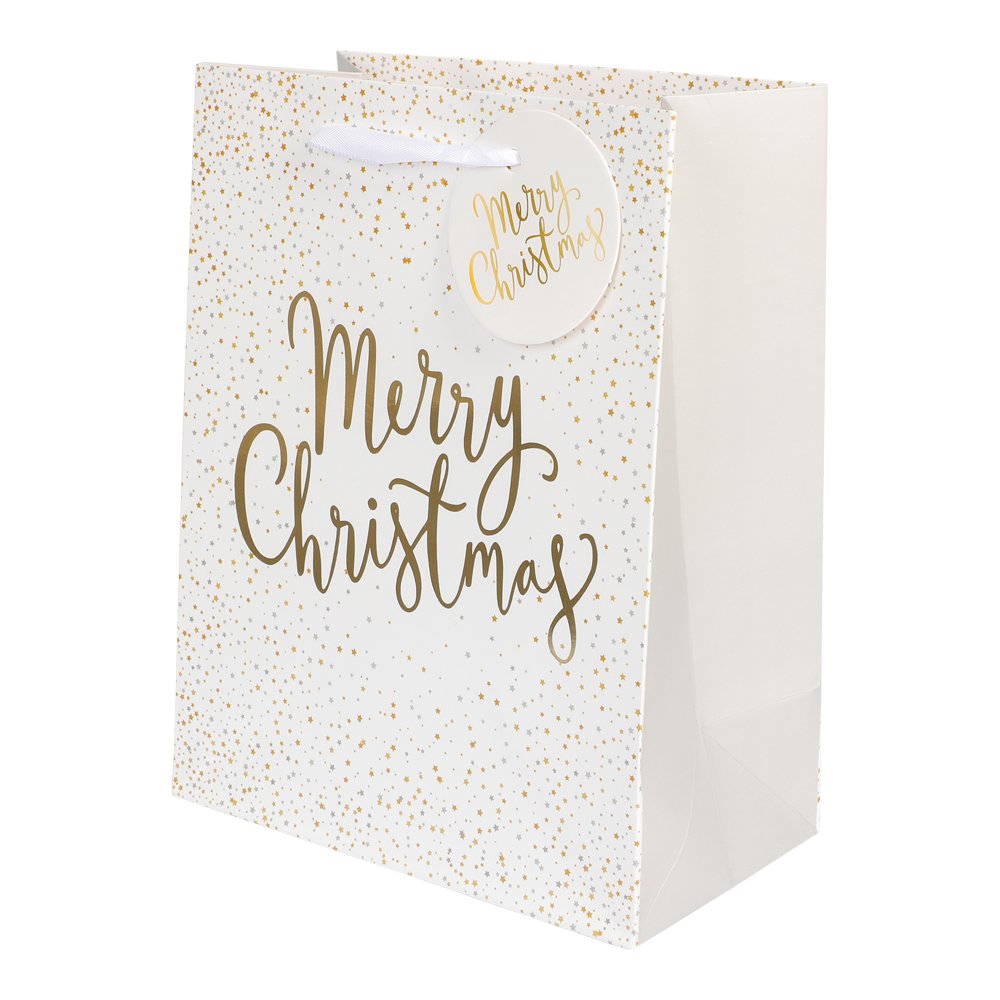 Vit presentpåse med guldfolierad text "Merry Christmas", guldstjärnor och vita handtag – perfekt för julklappar och presenter.