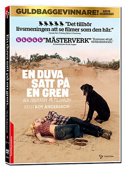 En Duva satt på en gren