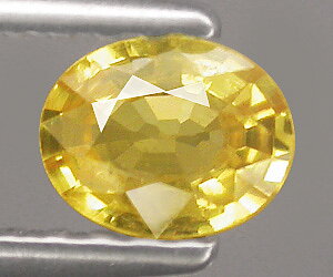 0.33 ct vacker oval naturlig gul safir ädelsten