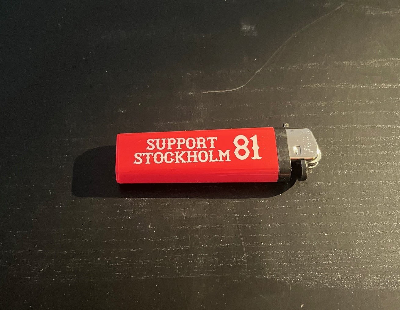 Lighter STHLM red