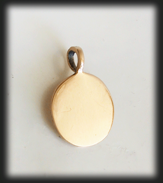 Litet Ohm-smycke / Aum halsband i brons. - 2