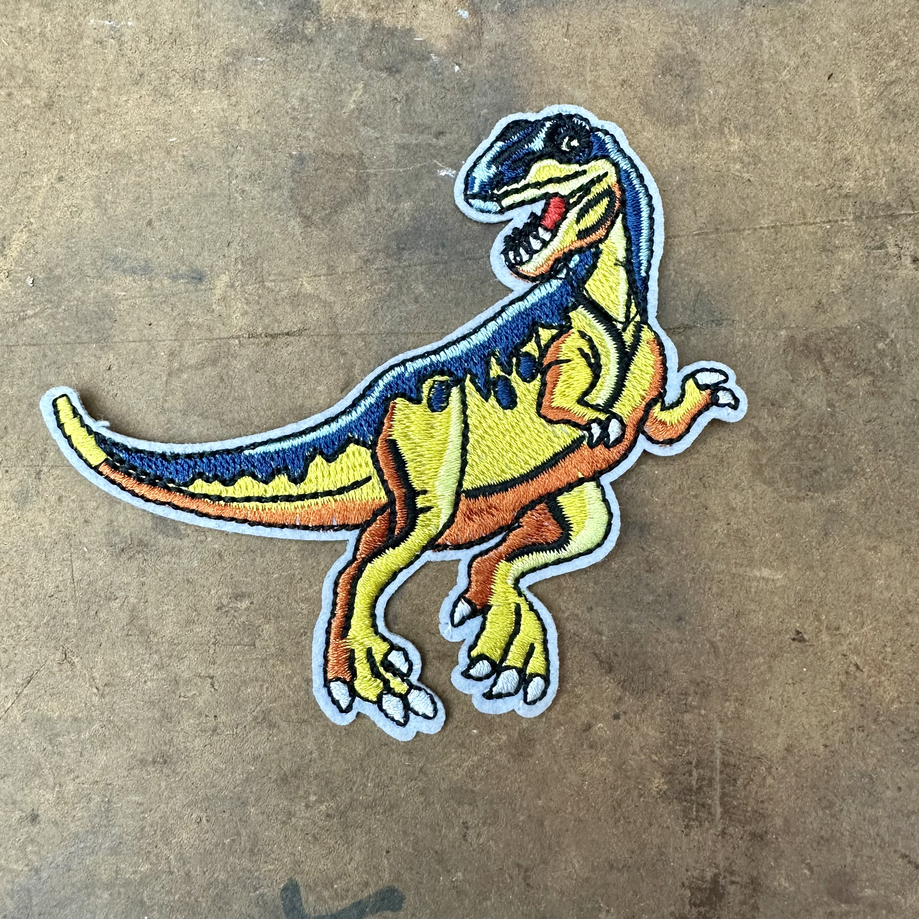 Tygmärke dinosaur 