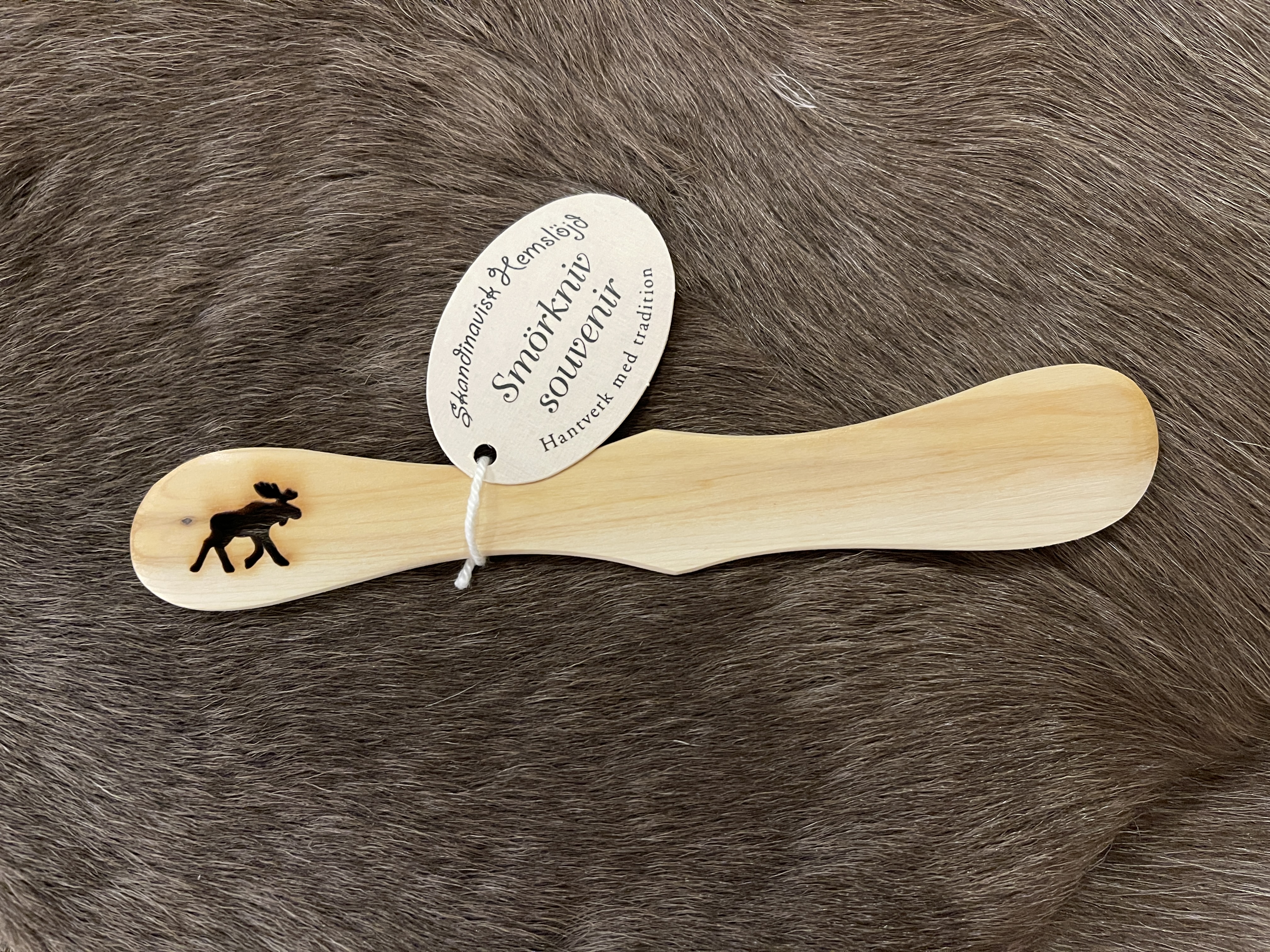 Buttermesser springender Elch
