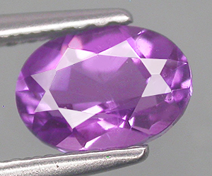 0.82 carat tjusig oval formad naturlig ametist sten - 3