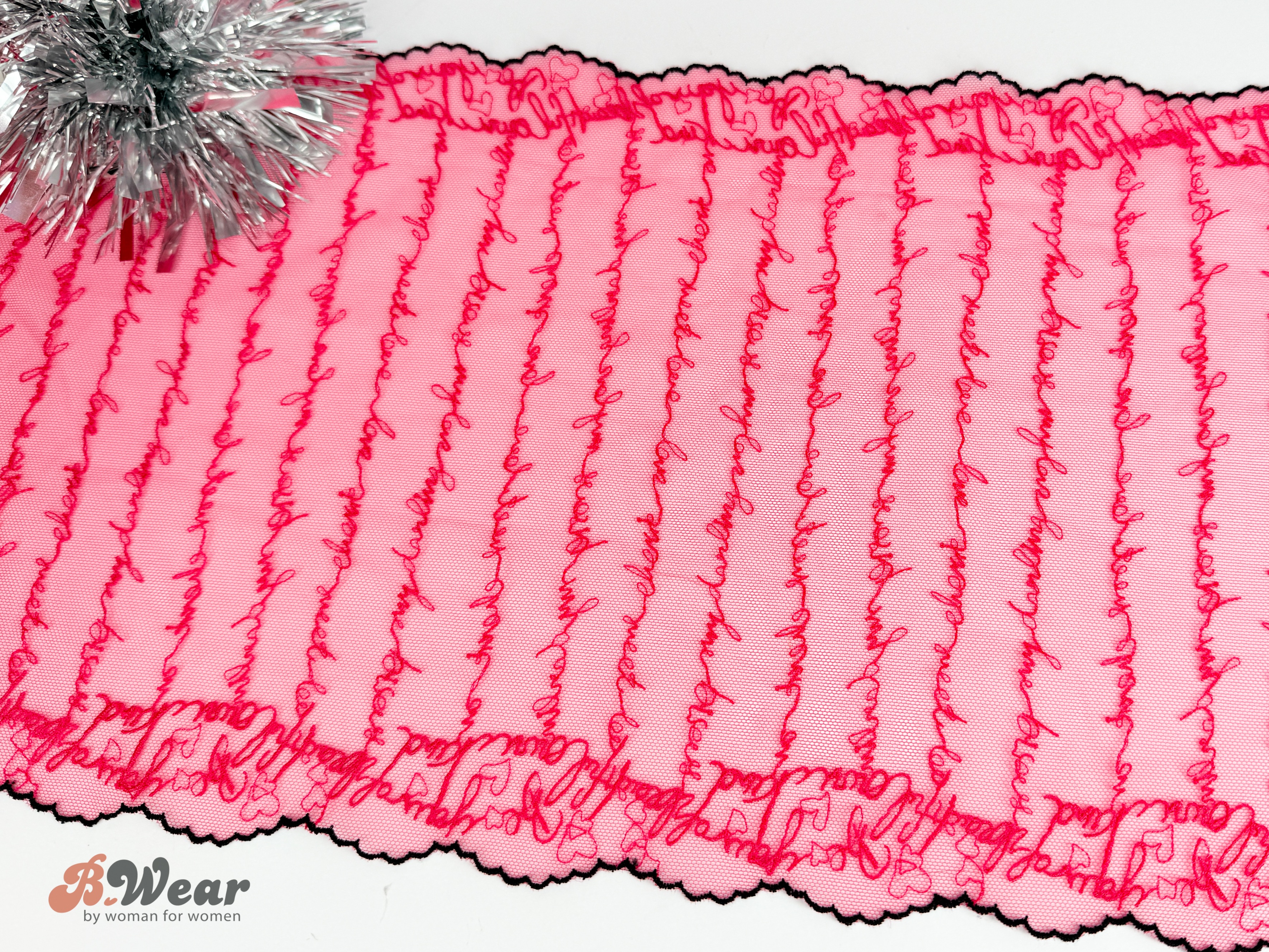 Beautiful non-stretch tulle lace in fuchsia with black edges - 23 cm