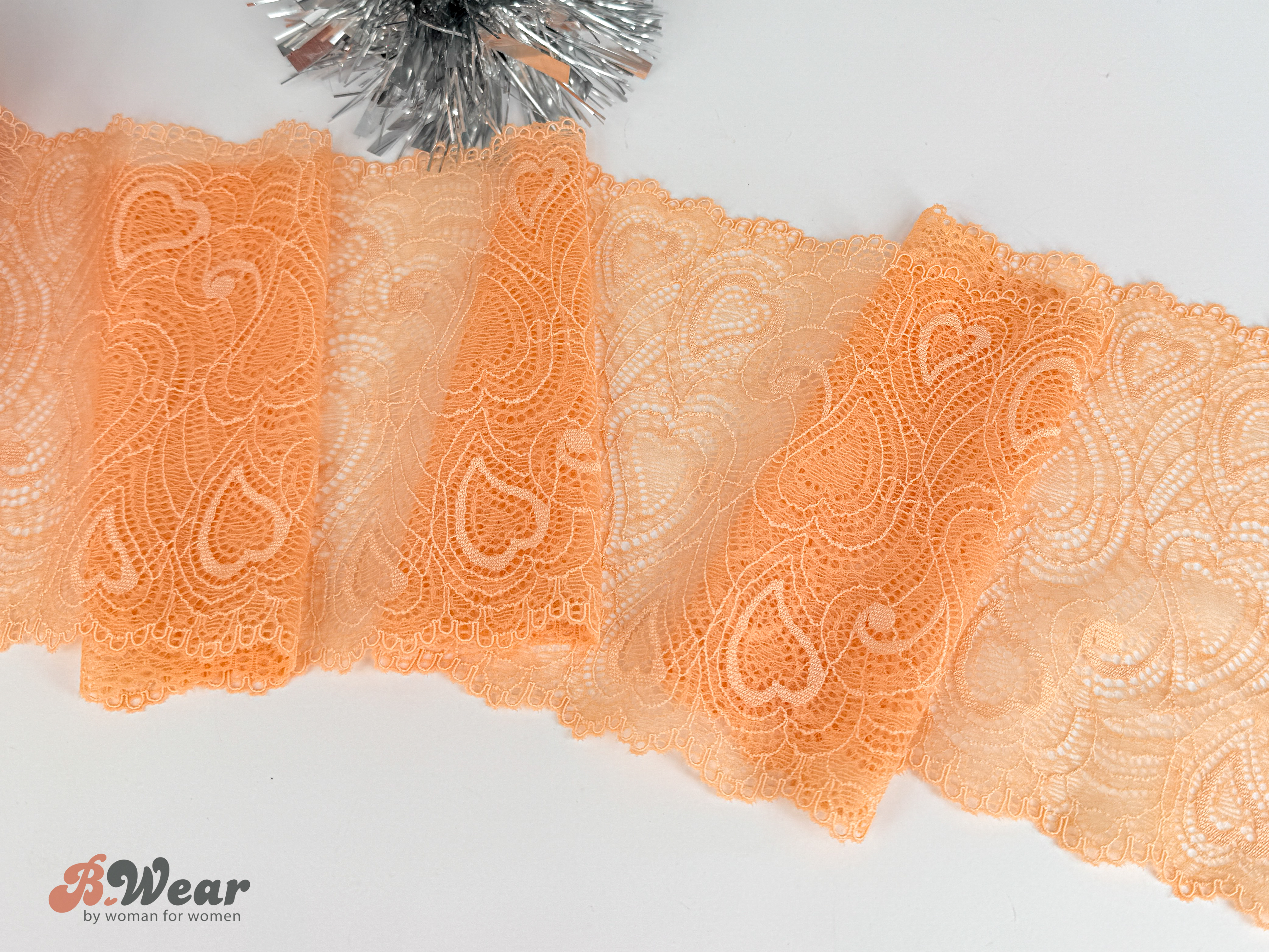 Stretch lace in light orange with hearts - 19 cm