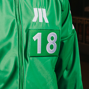Tygmärke Grön Linje 18
