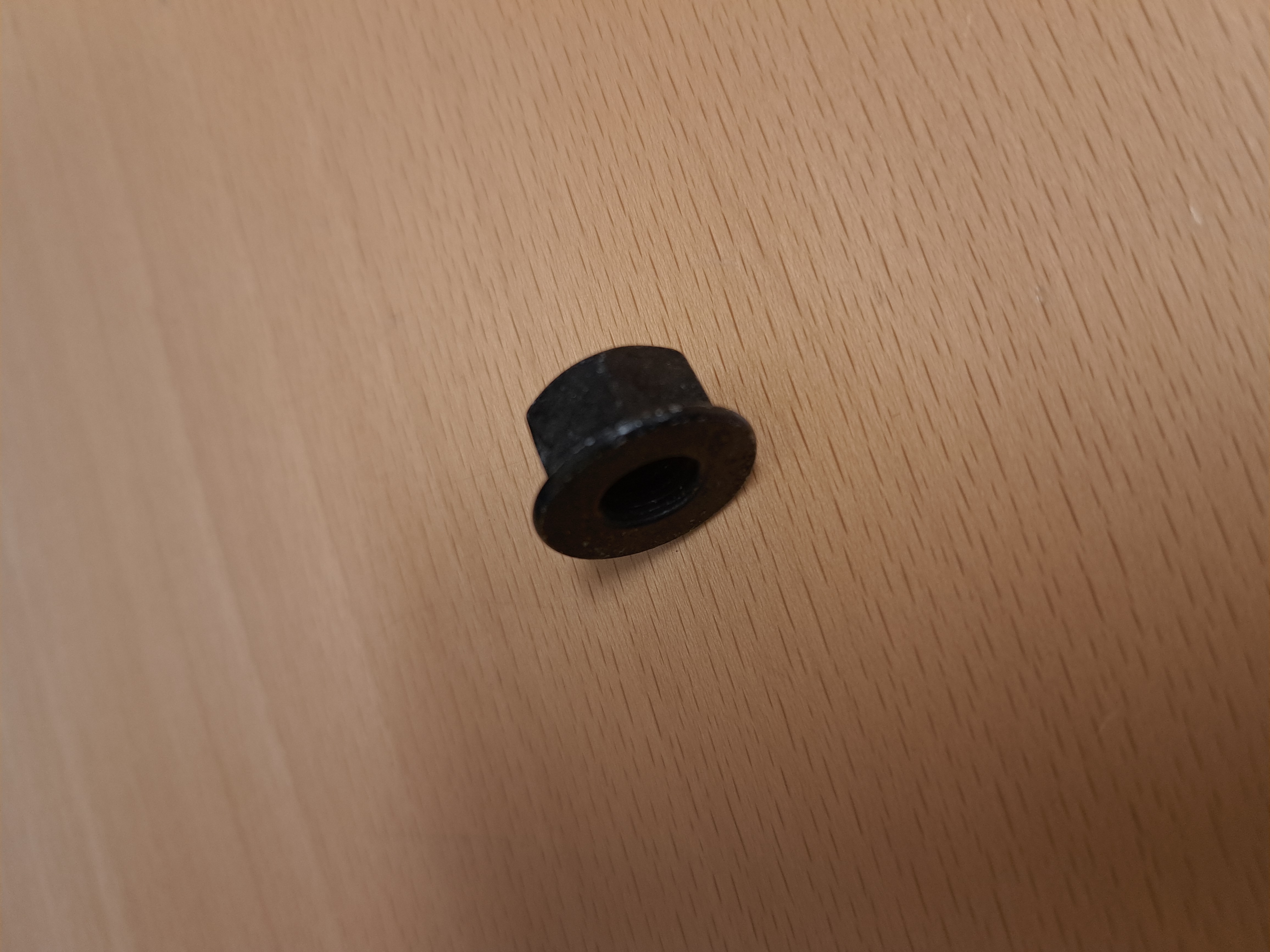 Flänslåsmutter