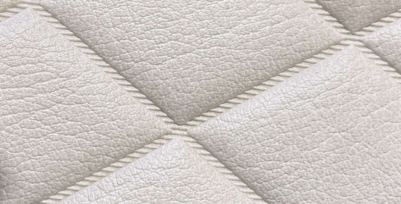 Konstläder svetsade rutor beige (207x983)