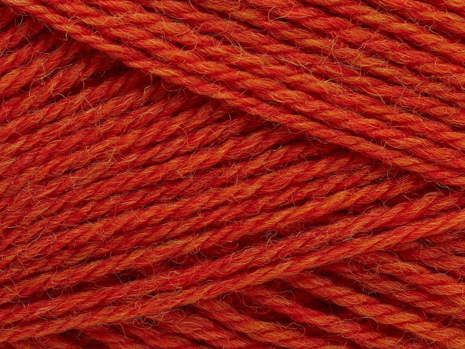 En närbild av Filcolanas ullgarn Pernilla i orange