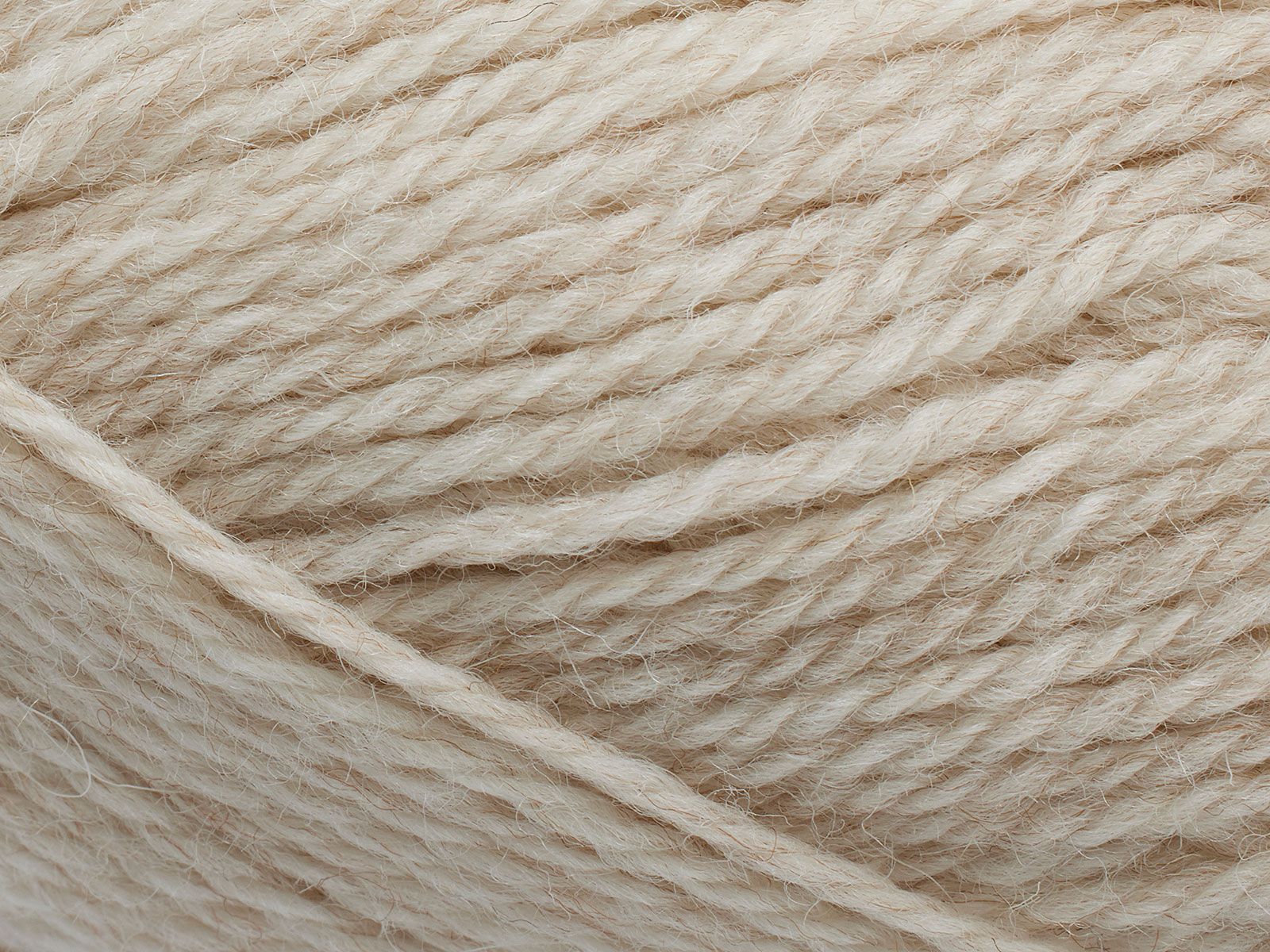 En närbild av Filcolanas ullgarn Pernilla i ljust beige