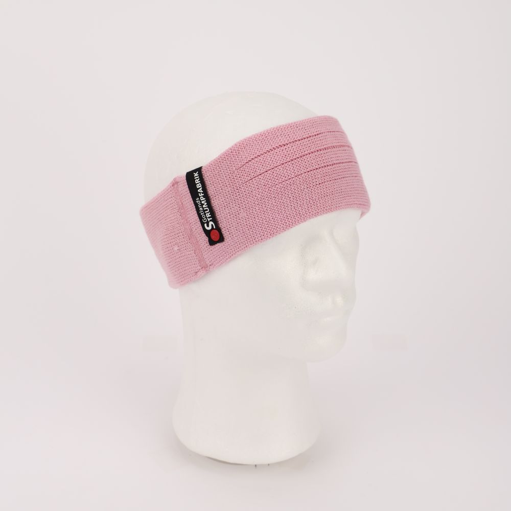 Stickat pannband av merinoull i färgen rosa