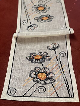 Linnelöpare. Svart blomma