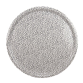 Rund bricka med diametern 38 cm. Beige botten med svarta prickar.