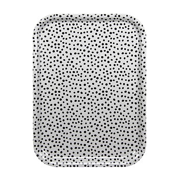 Rektangulär bricka i storlek 27×20 cm. Ljusgrå botten med svarta prickar.