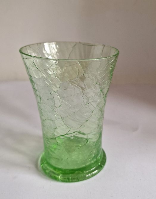Green cracked drinking glass