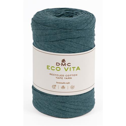 En stor rulle av bandgarnet Eco Vita Tape Yarn från DMC i petrol
