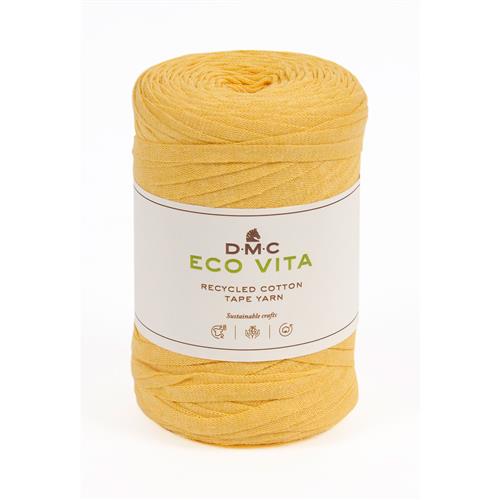 En stor rulle av bandgarnet Eco Vita Tape Yarn från DMC i gult