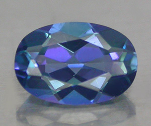 Piedra preciosa de topacio azul azoico natural ovalada calibrada de 6 x 4 mm