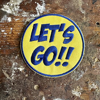 Tygmärke let’s go