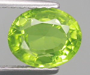 Preciosa piedra preciosa de peridoto suelta natural calibrada ovalada de 6 x 5 mm. - 3