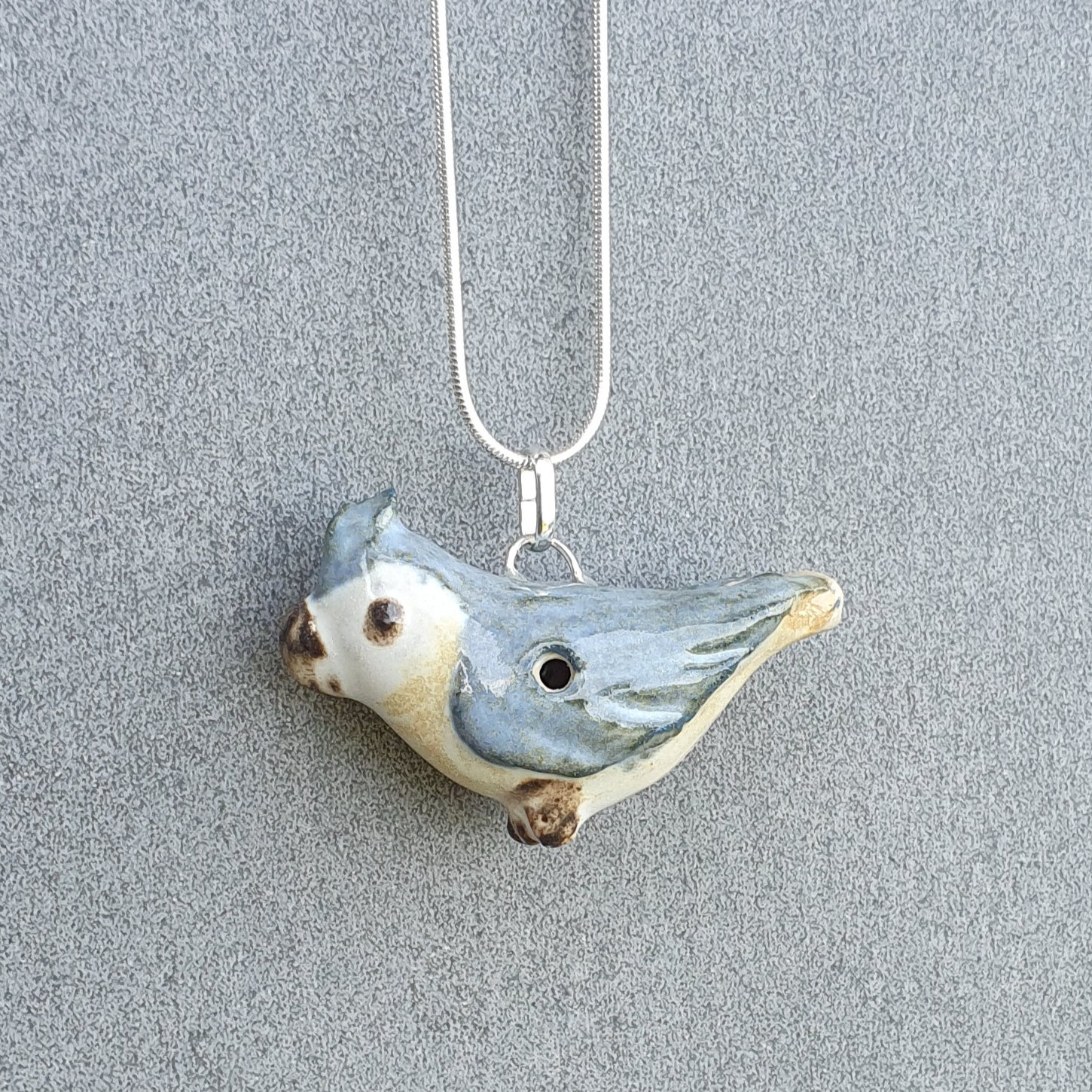 Parrot necklace whistle