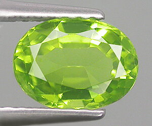 Impresionante piedra preciosa suelta de peridoto natural calibrada ovalada de 6 x 5 mm.