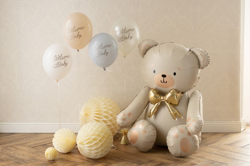 Sittande nalleballong i beige och guld till dop och babyshower.
