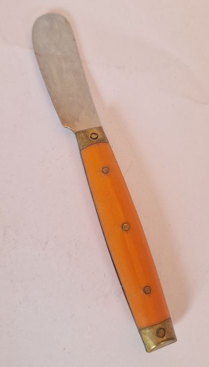 Melon type orange butter knife