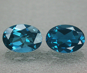 Gemas de topacio azul Londres natural de corte ovalado calibrado de 7 x 5 mm a juego de 1,90 ct