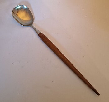 Salad spoon with pointed teak handle