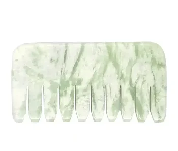 Gua Sha-kam til hovedbunden