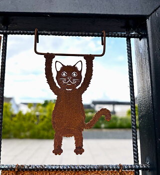 Katt som hänger och gungar för armeringsnät