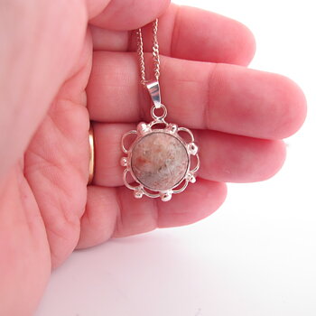 Necklace with hand cut stone  32x23mm