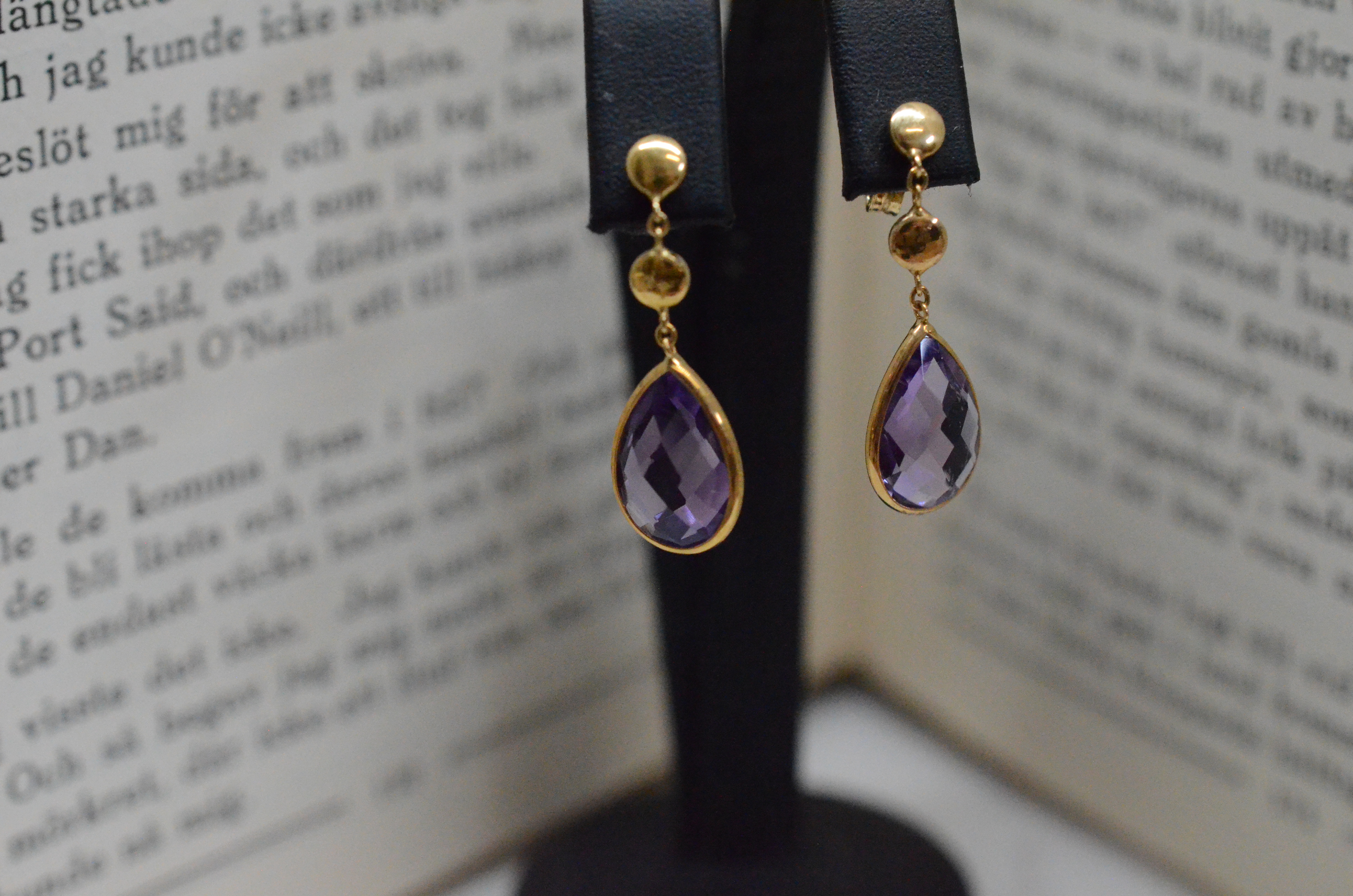 18k gold earrings with amethysts