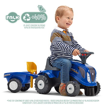 FALK Traktor New Holland ride-on med vagn, kratta, spade & ratt med tuta 1-3år