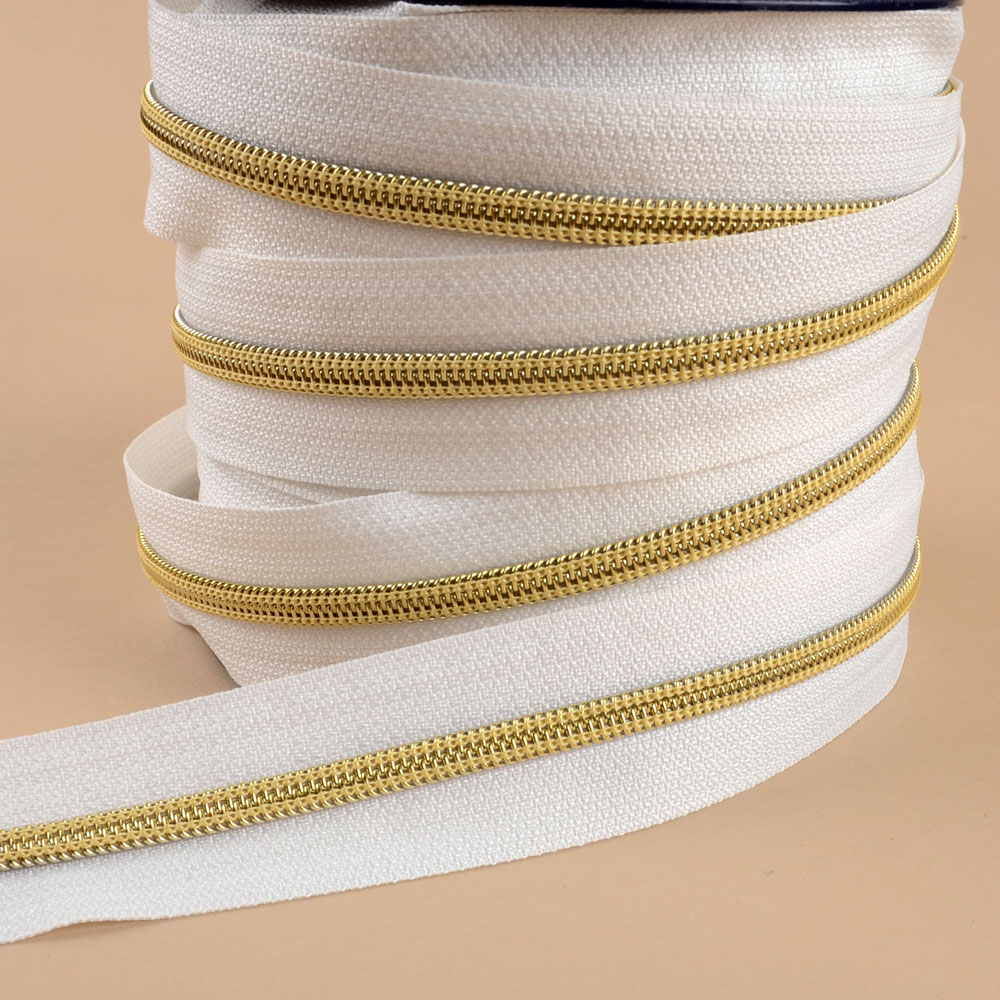  ZIPPER/ZIPPED - PER METERS 5MM WHITE/GOLD